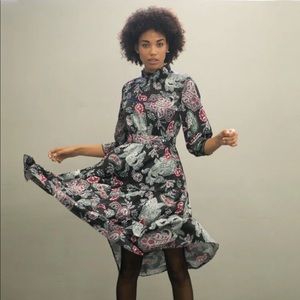 Mock neck ruffle hem paisley print flare dress